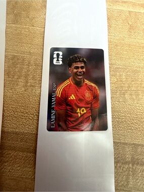 Panini FIFA Soccer Player Sticker of Lamine Yamal from Coca Cola Bottle